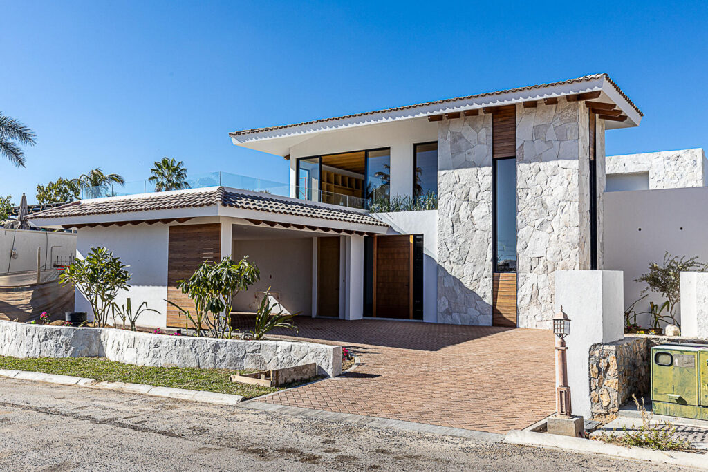 Cabo San Lucas Pedregal Csl Villa Felicidad is a 5-bedroom, 5.5-bath residence in Pedregal that combines scale, location, and proven income potential. Set just minutes from the main gate and within walking distance to the marina, it offers effortless access to Cabo's best dining and nightlife while maintaining privacy. The home features a private pool, expansive terraces, and panoramic marina – 104 Los Valles, San Jose del Cabo, BS