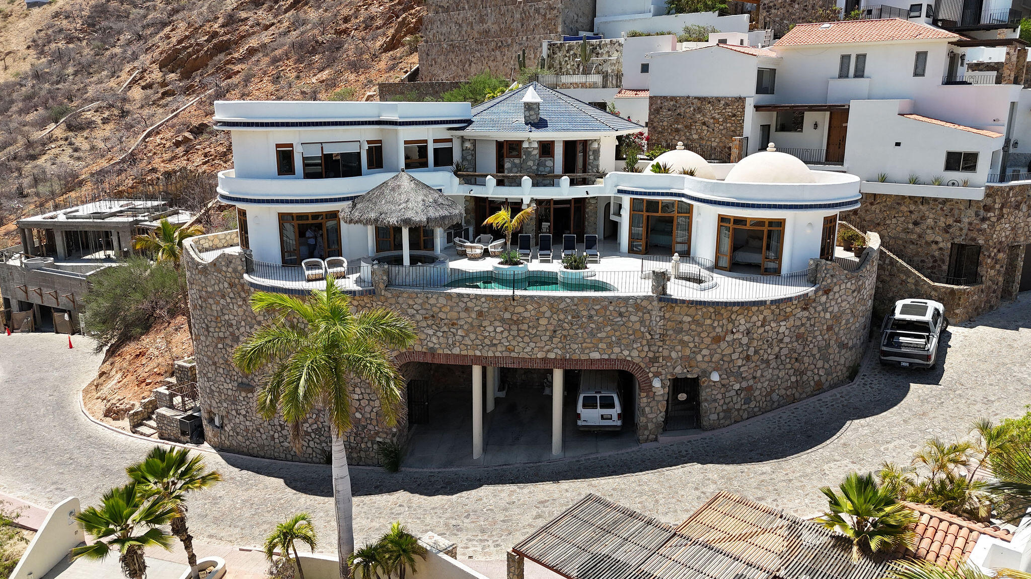 Cabo San Lucas Pedregal Csl Commandingly positioned in the exclusive enclave of Pedregal, Casa El Castillo offers rare walkable proximity to downtown alongside total hillside privacy. This 6-bedroom, 7.5-bathroom architectural estate--originally built by fitness icon Ray Wilson--was masterfully oriented to maximize its vantage point. The result is a breathtaking, unobstructed panorama spanning the Cabo San Lucas Marina, vibrant city lights, and dramatic for sale