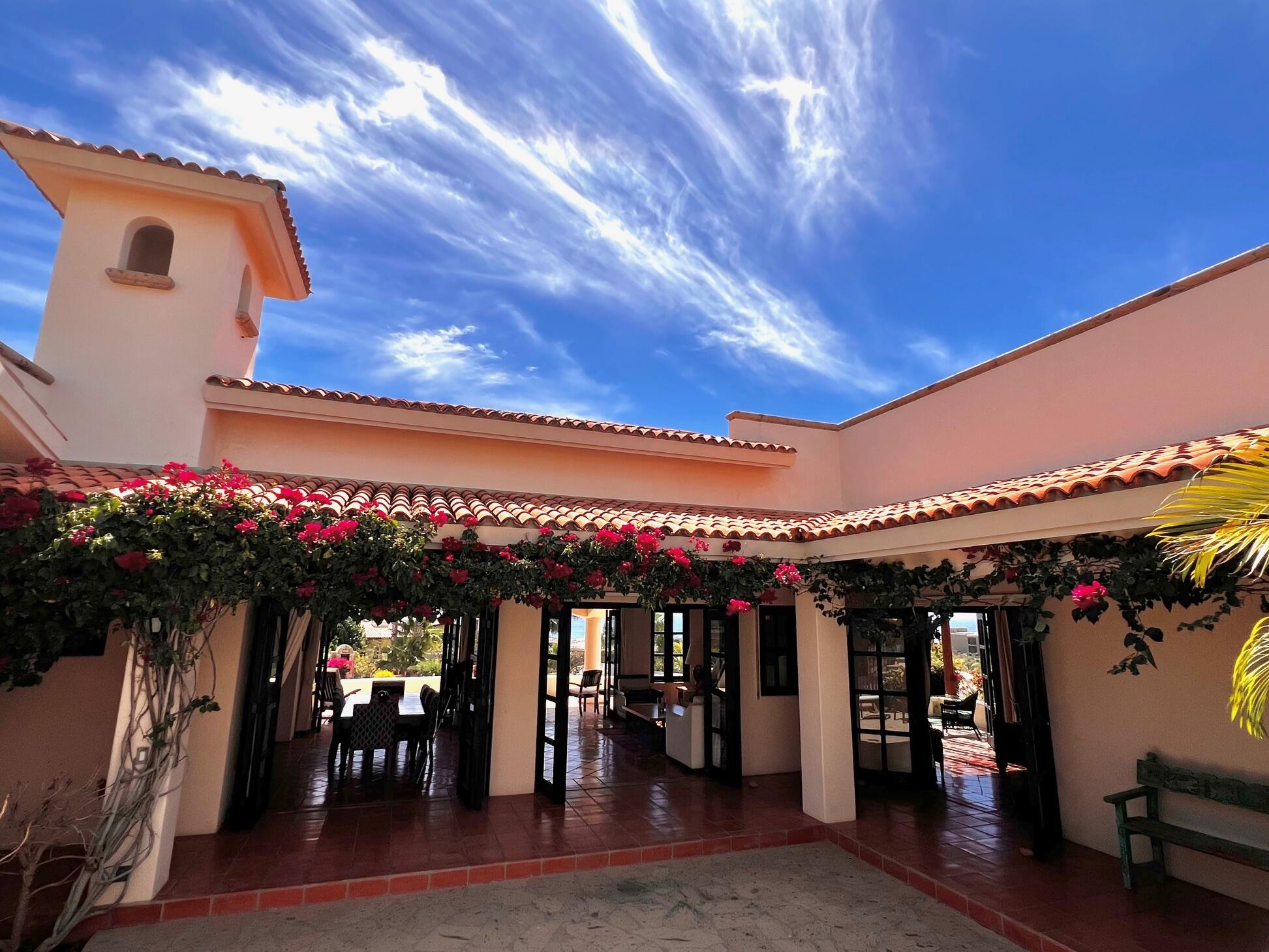 Cabo San Lucas La Noria One of the first homes built in La Noria, within the amenity rich development of Puerto Los Cabos, this very unique two bedroom, two bath home, followed the Hacienda style's original design guidelines, with a large entry courtyard, rooms to the sides and opening to the main living area, kitchen and outdoor patio/deck.The initial concept and plans were designed with a third bedroom in mind, to be built at a different time, yet the functionality of the two bedroom house ended up suiting its owners well and thus house did not grow within the still remaining buildable area of the homesite.Subsequently, a second design concept was planned, to build a second level master bedroom with panoramic for sale