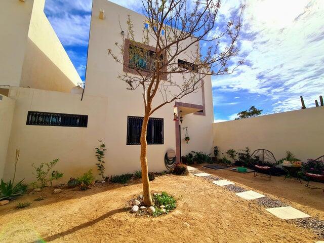 Cabo San Lucas Csl N-E Of19:Genral GREAT INVESTMENT OPPORTUNITY - ENDLESS POSSIBILITIES!Discover the untapped potential of Casa Altezza, a single-family Two-story home nestled in a sought-after residential community - Northern Cabo San Lucas, and conveniently located off Highway 19-Tamaral Ave. What sets this property apart? THE LARGEST LOT in the cluster! Offering unique development potential! Expand the current home, add residential rental-rooms, design a covered garage, or build the ultimate entertainment space with seamless access--this property's extra land is a blank canvas for creativity and investment. Completed in April 2022, Casa Altezza features 3 bedrooms and 2.5 bathrooms, including an ensuite bath in the master bedroom. The home boasts a spacious front patio with mature plants and trees, along w/a back patio including concrete flooring.Several thoughtful upgrades include: - Custom-designed kitchen with a modern, minimalist concept and an expanded window for ample natural light. - Enclosed bonus room for laundry and storage. - High 2.5-meter privacy walls surrounding the property. - Iron-protected doors and windows with installed screens. - Abundant water supply with a total of 23,700 liters, including two cisterns and a rooftop water tank. - New appliances, including a full-size washer & dryer, stove, hood, refrigerator, two inverter mini-splits, and ceiling fans.Casa Altezza sits in an ideal location, just 10 minutes from downtown Cabo San Lucas, Medano Beach, Puerto Paraiso Mall, and The Marina. Daily conveniences like supermarkets, shopping centers, medical facilities, and schools are just minutes away. Plus, the community is a gated neighborhood with electronic access, and a remarkably low HOA monthly fee of only for sale