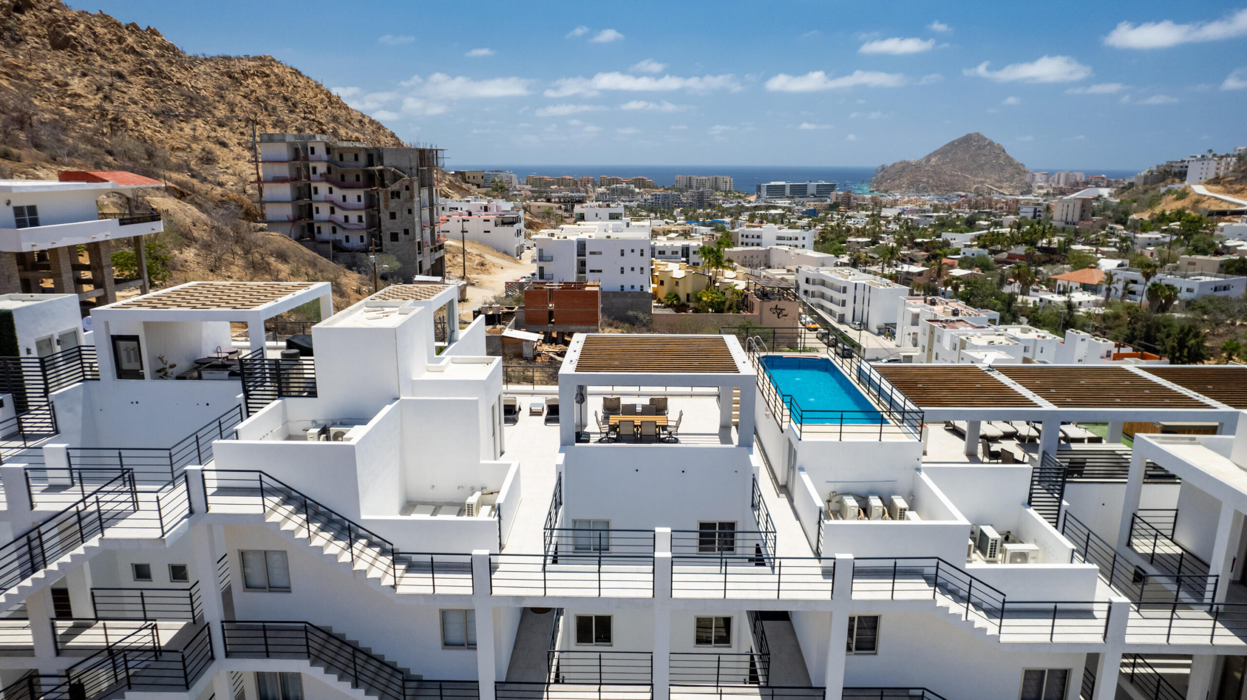 Cabo San Lucas Luxotica Iii Welcome to Sunset Corner Condo 201, a bright and inviting second-floor corner unit in the growing Sunset area of Cabo San Lucas. This 2-bedroom, 2-bathroom condo features an open-concept layout, high ceilings, abundant natural light, and pleasant city and mountain for sale