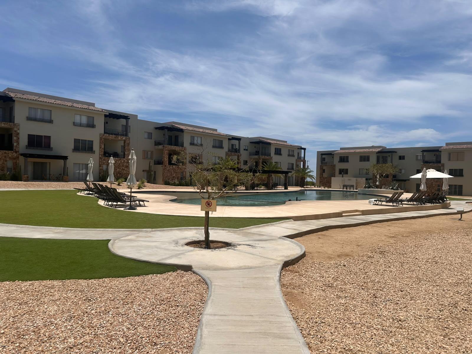 Cabo San Lucas Camino Del Mar Ground-Floor Condo | La Joya at Camino del Mar, El TezalDiscover the perfect blend of comfort, convenience, and investment potential in this beautiful ground-floor condominium located in the highly sought-after La Joya Residences, within the master-planned community of Camino del Mar in El Tezal, one of Los Cabos' fastest-growing and highest-appreciating neighborhoods.This thoughtfully designed residence features:* 2 spaci ous bedrooms* 2 full bathrooms* TV / Family Room* Ground-floor location with direct access to the pool* Swimming pool right in front of your terraceResidents also enjoy exclusive resort-style amenities, including:✔️ Semi-Olympic swimming pool✔️ Fully equipped fitness center✔️ Kids' Park✔ – Maldivas, Cabo Corridor, BS