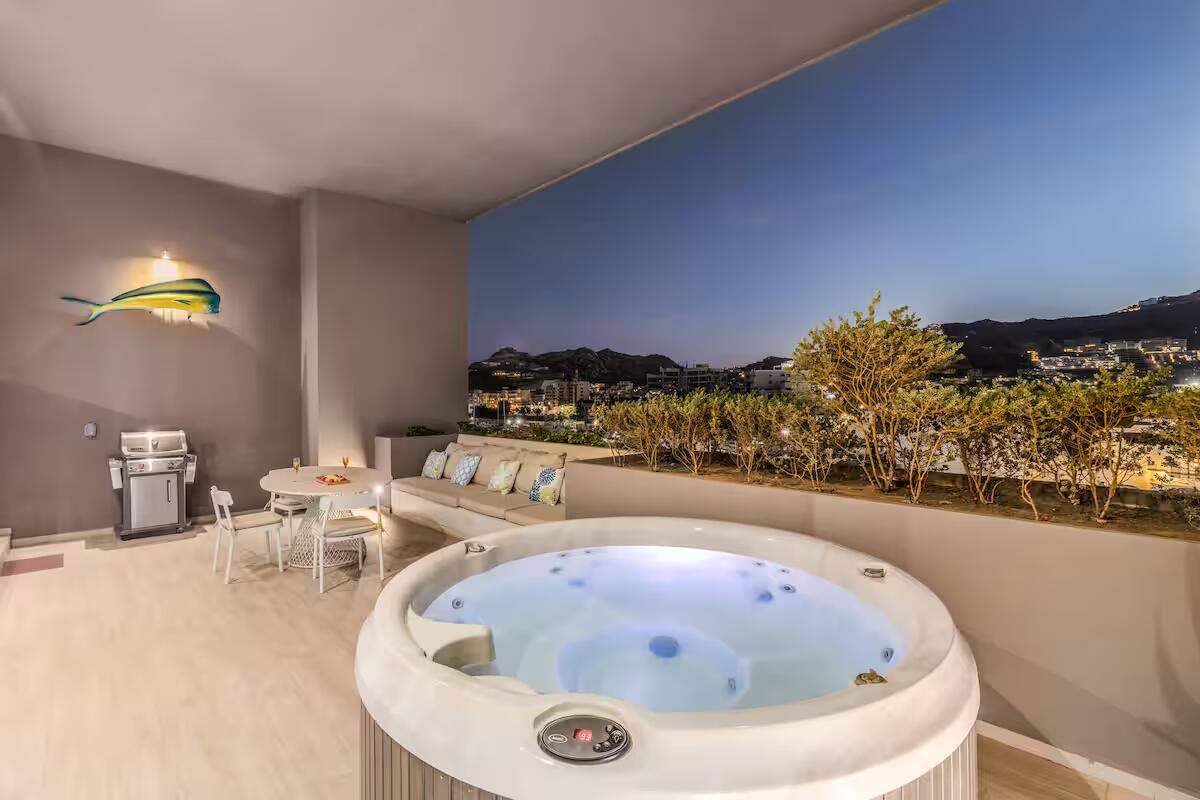 Cabo San Lucas The Paraiso Residences Experience the best location and the luxury with Condo Marina Vista, located at The Paraiso Residences, this modern 2BR/2BA condo is just steps from the world famous Cabo San Lucas Marina, putting you in the heart of the action. Delight yourself with the impressive private terrace, with jacuzzi, grill and much more. With its new and modern taste, Condo Marina Vista is your best option for your second home or investment in Cabo. This condo features modern decor in perfectly lit spaces, fully equipped kitchen with everything you will need, including electric stove, dishwasher, oven, microwave, etc. A spacious and fun living room perfect for entertaining and relaxing, with a comfortable sofa that can make extra sleeping space for one more guest. Two large bedrooms with King size beds and bathroom with shower, both with ample wardrobe space, TV and luxury bedding. The living room is spacious and perfect for entertaining, with a comfortable sofa that can function as an additional sleeping space for one or two more children.Wait until you come out! First open the pocket doors from the living room to the master bedroom to extend your area to the outside terrace with jacuzzi, barbecue and dining for six. Enjoy the huge spacious terrace and its magnificent for sale