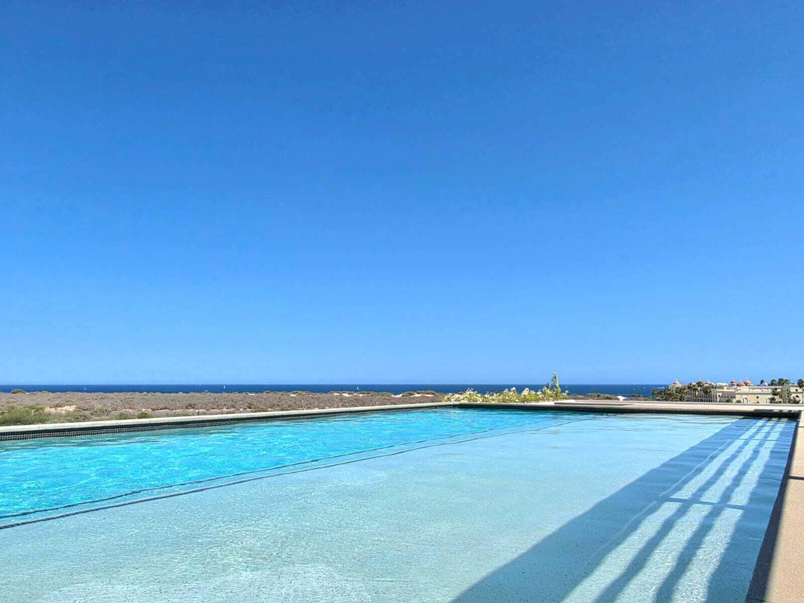 Cabo San Lucas Amaterra Corner unit- Amaterra 304 D - is ideally located just 350 meters from Medano Beach, within the Amaterra Phase 2 building. This condo features 2 bedrooms and 2 full bathrooms, and is offered fully furnished and equipped, with one assigned parking space. It's a great option whether you're looking for a comfortable place to live or a property with rental potential.Residents enjoy access to a shared rooftop with a pool and beautiful – sn sn, Cabo Corridor, BS