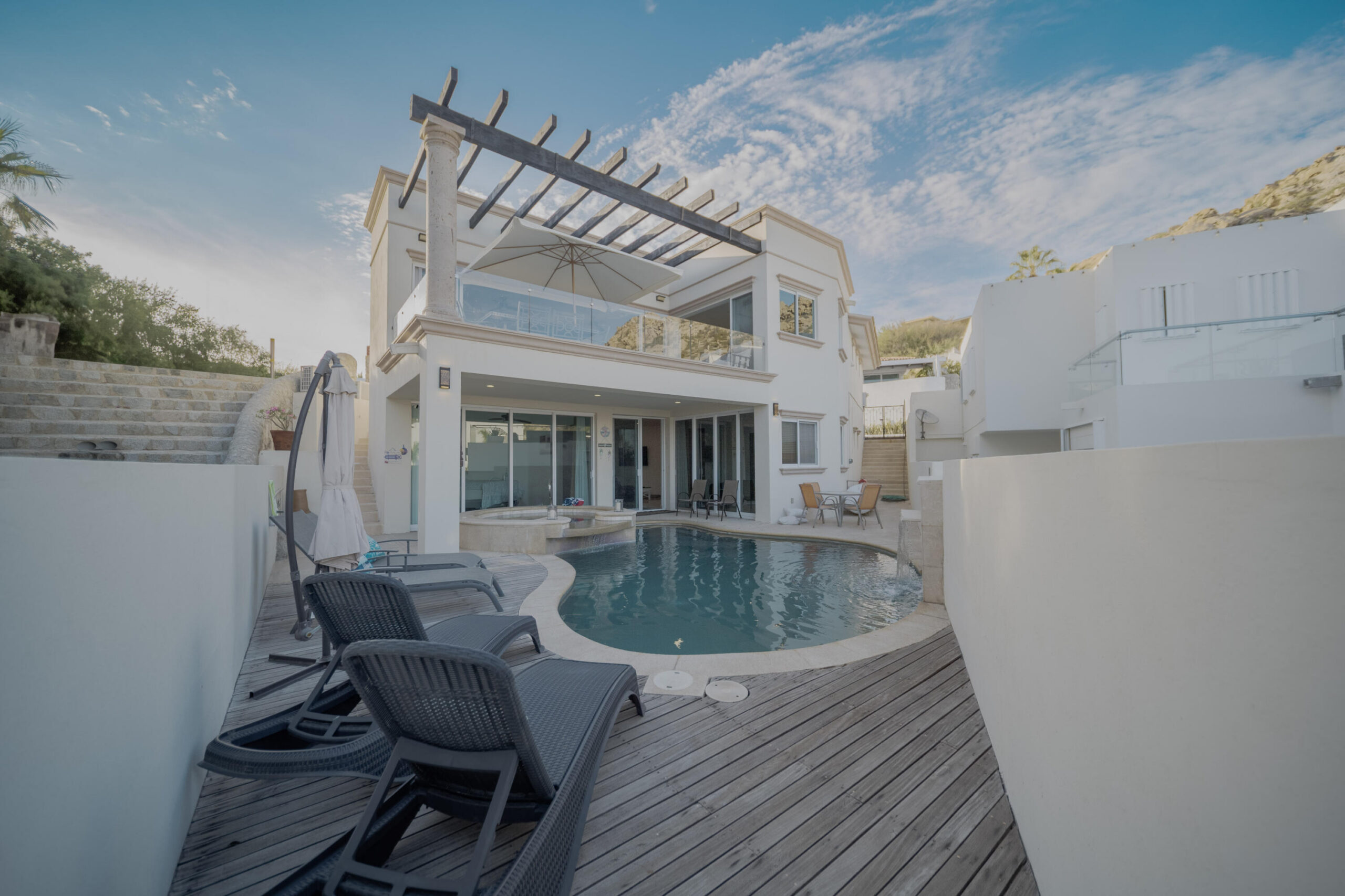 Cabo San Lucas Blue Moon Perched in Pedregal's coveted Valley of the Moon, this contemporary two-story residence captures unblockable ocean for sale