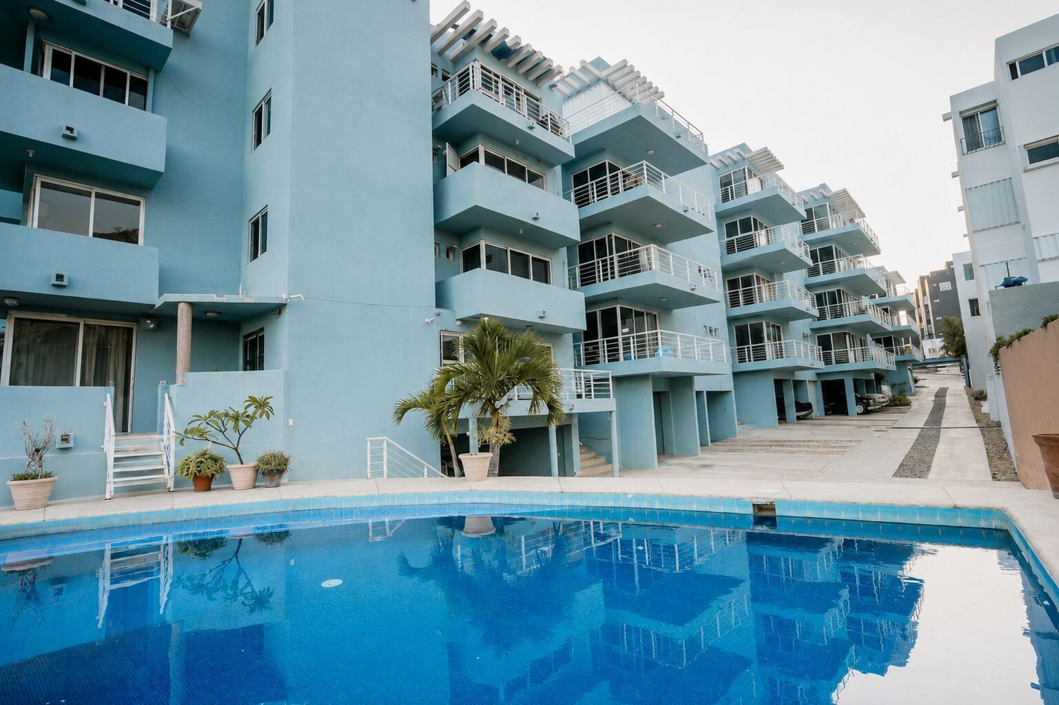 Cabo San Lucas Las Arenas 2-bedroom, 2-bathroom condo featuring a fully equipped kitchen, spacious living and dining areas, laundry room, walk-in closet, and a private terrace with direct access to the swimming pool. The building offers elevator access and includes one assigned parking space. An excellent opportunity for both full-time living and investment in a community with attractive amenities.Condo de 2 recámaras y 2 baños completos. Cuenta con cocina totalmente equipada, sala, comedor, área de lavado, un walk-in closet y terraza con acceso directo a la alberca. El edificio ofrece elevador e incluye 1 espacio de estacionamiento asignado. Una excelente opción para vivir o invertir en una ubicación con atractivas amenidades. for sale