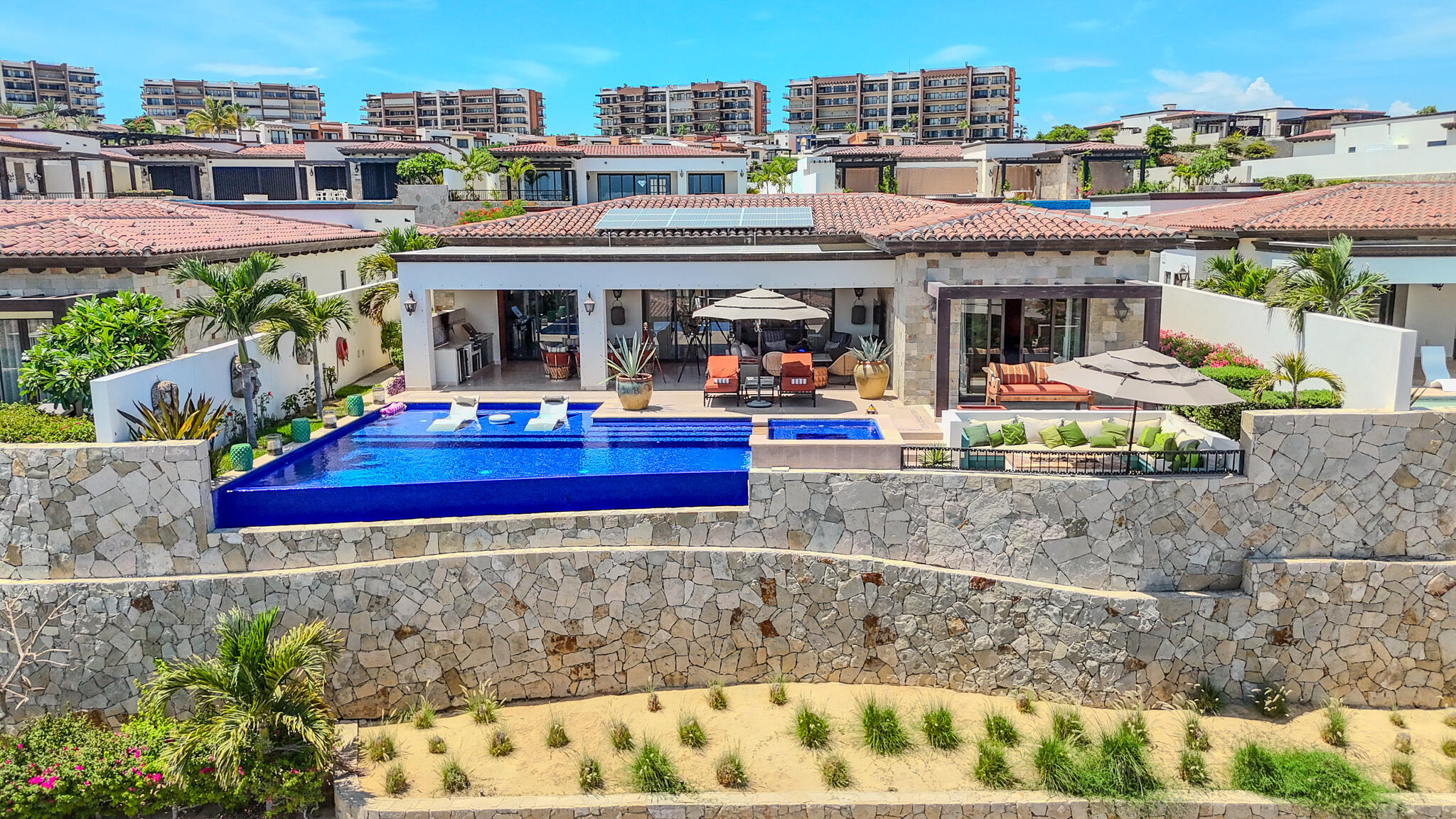 Cabo San Lucas El Tule-Inland:General Rare investor opportunity in the San José Corridor. 2 luxury residences fully completed and move-in ready. 8 additional units with land secured and full blueprints in place -- ready to build to buyer's vision. At for sale