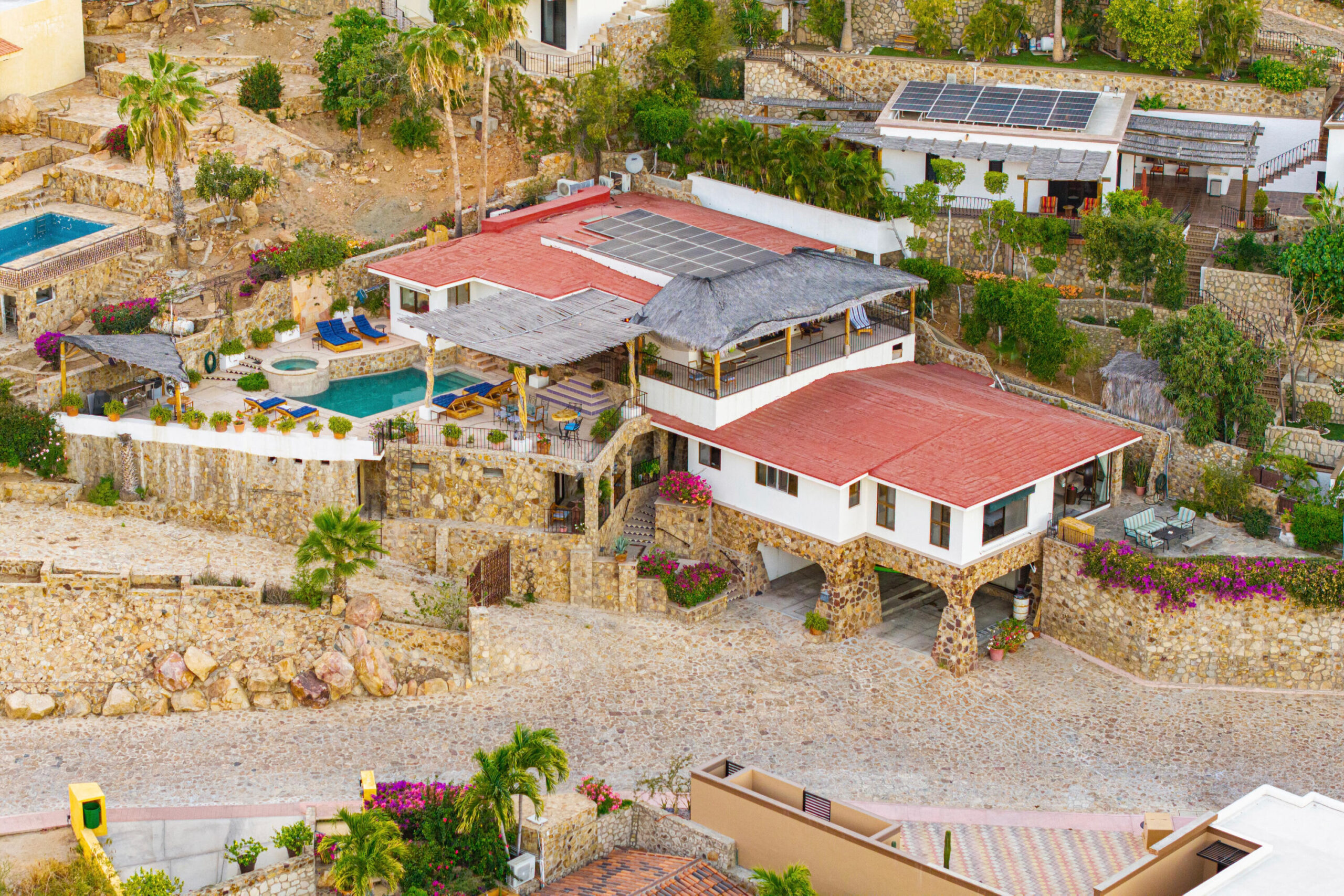 Cabo San Lucas Pedregal Csl Villa Felicidad is a 5-bedroom, 5.5-bath residence in Pedregal that combines scale, location, and proven income potential. Set just minutes from the main gate and within walking distance to the marina, it offers effortless access to Cabo's best dining and nightlife while maintaining privacy. The home features a private pool, expansive terraces, and panoramic marina for sale
