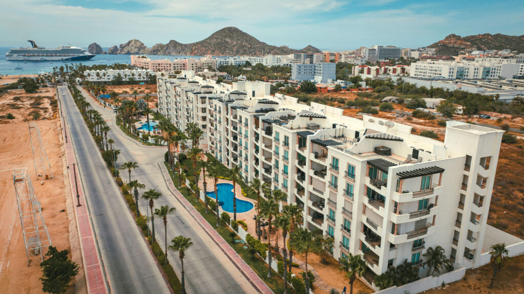 Cabo San Lucas Puerta Cabos Village LOCATION, LOCATION, LOCATION!This beautifully appointed 2-bedroom, 2-bathroom condo is located just one block from Medano Beach, Cabo San Lucas' most iconic beach, well-known for its long stretch of golden sand and crystal-clear, swimmable waters.Offered fully furnished and move-in ready, the residence features an open-concept living area that flows seamlessly onto a spacious private terrace--perfect for relaxing or entertaining. Whether you're looking for a vacation home or an income-producing investment, this property is ready to enjoy from day one.The generous primary suite boasts an oversized en-suite bathroom complete with a luxurious Jacuzzi tub, creating the perfect private retreat.Additional features include one underground parking space and a private storage room. Residents enjoy exceptional community amenities, including 24-hour security and two large swimming pools. Ideally located just minutes from the Cabo San Lucas Marina, downtown, world-class dining, shopping, and vibrant nightlife, this condo offers the perfect combination of convenience, lifestyle, and investment potential. – 3757 Blvd. Constituyentes, Cabo San Lucas, BS