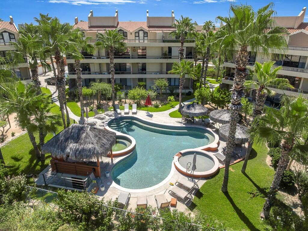 Cabo San Lucas Marea Los Cabos Pelicano 402 is a turnkey 2-bedroom, 2-bathroom residence, fully furnished and move-in ready. Its open-concept layout seamlessly connects the living, dining, and kitchen areas to a spacious continuous terrace, also accessible from both bedrooms, creating effortless indoor-outdoor living. Designed to maximize privacy, natural light, and functionality, this home offers a peaceful and inviting atmosphere. Ideal as a full-time residence, vacation home, or investment property, it combines quality craftsmanship, contemporary finishes, and the added confidence of buying directly from the developer. for sale
