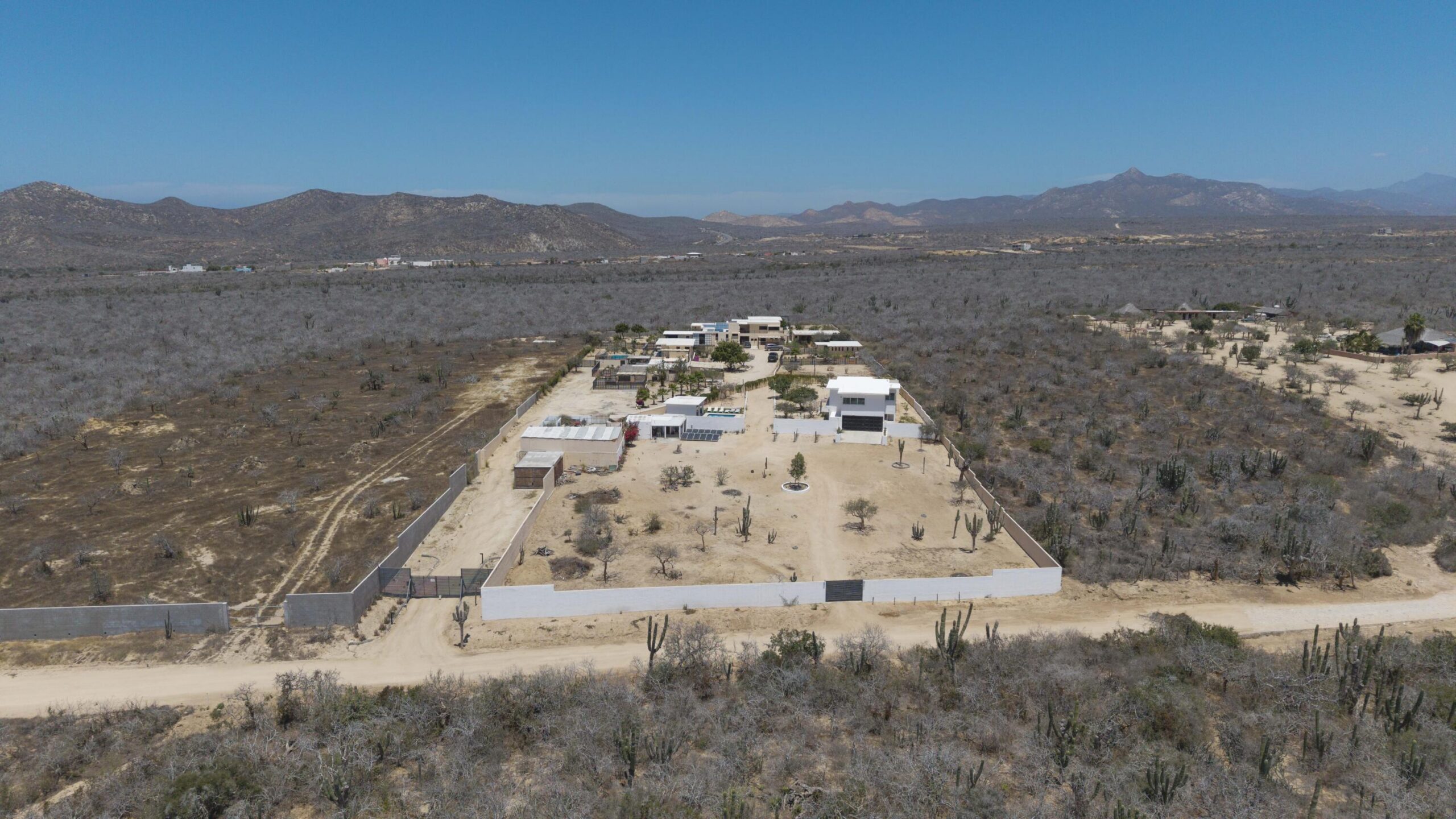 Cabo San Lucas El Tule-Inland:General Rare investor opportunity in the San José Corridor. 2 luxury residences fully completed and move-in ready. 8 additional units with land secured and full blueprints in place -- ready to build to buyer's vision. At for sale