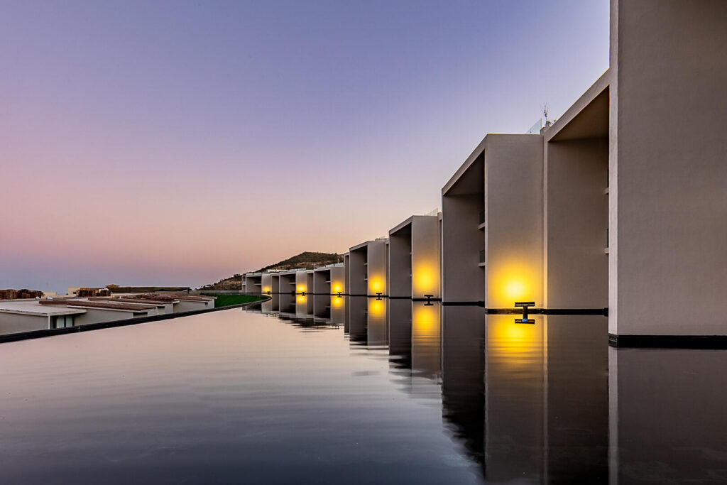 Cabo San Lucas Cora SUNSET A 101- the crown jewel of the entire development. A rare 6-bedroom, 5.2-bath residence spanning two full living levels: the main floor plus a private underground bunker suite with its own living room, dining room, kitchen, bedrooms and baths -- ideal for multigenerational living or an income-producing guest retreat. Enjoy a private pool, jacuzzi, fire pit and BBQ area under an extended pergola, plus an extended terrace beside a tranquil espejo de agua. Ocean – SUNSET PASEO DEL MONTE CLUB CAMPESTRE, San Jose del Cabo, BS
