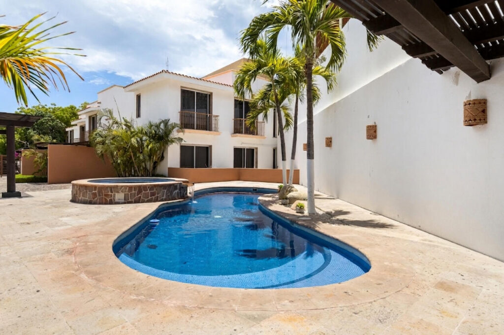 Cabo San Lucas Santa Rita This charming townhome is located in a secluded enclave of eight in the exclusive neighborhood known as Pedregal de Cabo San Lucas just steps to town. This 2 bedroom 2.5 bathroom offers private access through an electric gate and a carport with a pergola. As well as a pool and BBQ available for residents. Beautiful top of the line finishes throughout. With an open concept layout, balconies in each bedroom, an open courtyard, walk-in closet, marble and granite counters add to the charm of this spacious townhome. Residents enjoy the local amenities redefining the Cabo lifestyle and to the most discerning individuals who call this their home away from home. From beach access where the sparkling waters of the Pacific Ocean contrast the sunset where you can watch the seasonal whales and turtle release, to a gym & spa offering treatments and a relaxation experience. Residents have exclusive access to establishments offering exquisite cuisine, The courts cafe offering breakfast & lunch as well as Fenix Restaurant offering day and night service. As well, in the heart of the development, with mountain – TORRE 2 CABO CORRIDOR, Cabo Corridor, BS
