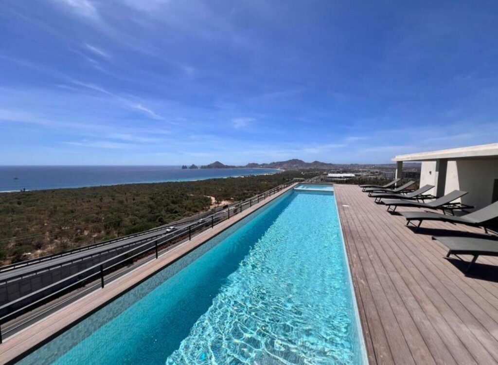 Cabo San Lucas Torre Catalina Discover unparalleled luxury in this exquisite Penthouse overlooking the iconic Cabo San Lucas arch. Located in Tezal, just moments away from pristine beaches, world-class dining, and vibrant nightlife, this residence offers the perfect blend of privacy and proximity to all that Cabo San Lucas has to offer. Every detail of this Penthouse exudes sophistication and elegance, from its immaculate interior decor to its state-of-the-art amenities. Designed for both relaxation and entertainment, the spacious living areas flow seamlessly onto expansive terraces, where you can savor the spectacular unsets over the Sea of Cortez. – Torre Catalina, Cabo Corridor, Cabo Corridor, BS